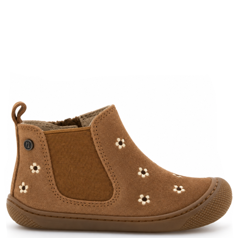 A single toddler ankle boot in brown suede and elastic, decorated with small white and brown flower appliqués, shown from a side profile on a white background.