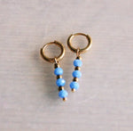 Stainless steel earrings with facets - light blue