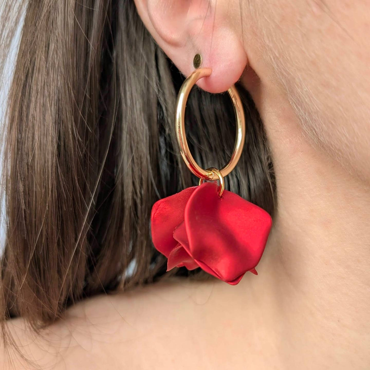 POPPY hoop earrings in electric red, worn