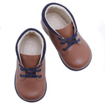(2440-28) Emel Brown first shoes.